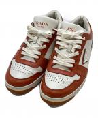 PRADAプラダ）の古着「ダウンタウンレザースニーカー」｜ホワイト×オレンジ