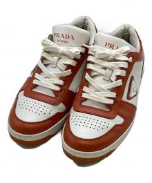 PRADA（プラダ）の古着「ダウンタウンレザースニーカー」｜ホワイト×オレンジ