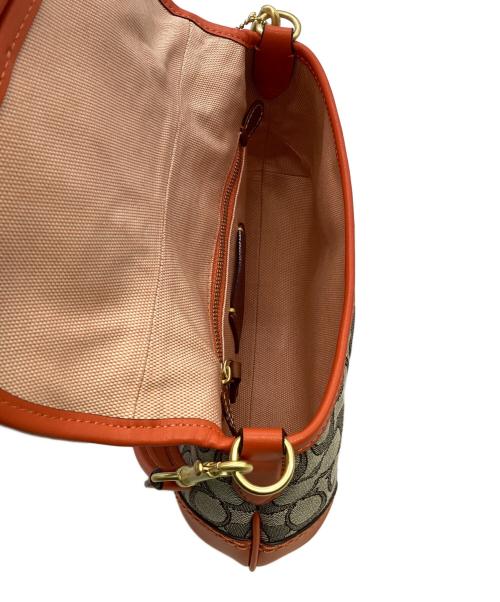 COACH（コーチ）COACH (コーチ) ソーホーバッグ ベージュ×オレンジの古着・服飾アイテム