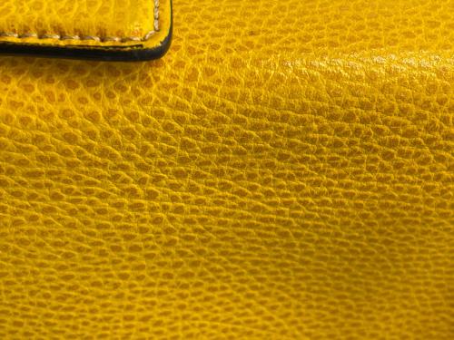 E MARINELLA（イー マリネッラ）E MARINELLA (イー マリネッラ) クラッチバッグ イエローの古着・服飾アイテム