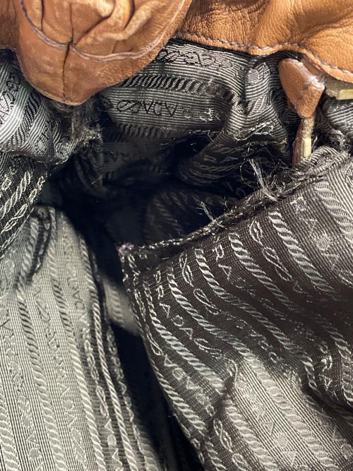 PRADA（プラダ）PRADA (プラダ) サイドリボン2WAYバッグ ブラウンの古着・服飾アイテム