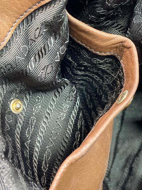 PRADA（プラダ）PRADA (プラダ) サイドリボン2WAYバッグ ブラウンの古着・服飾アイテム