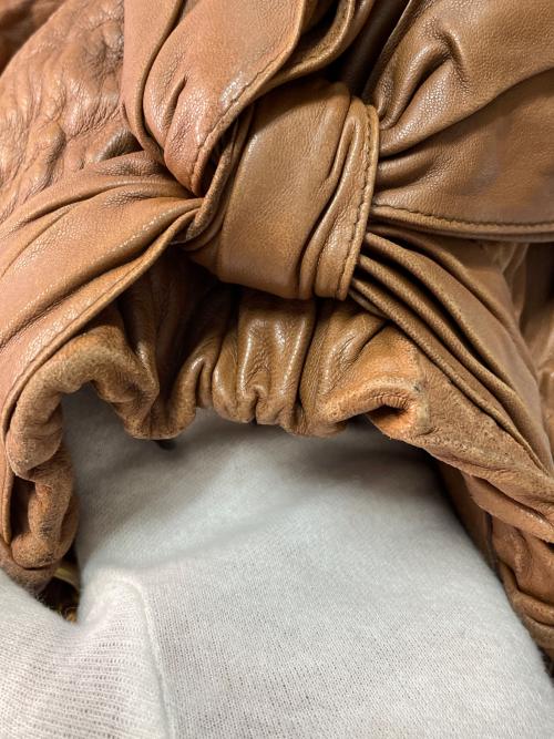 PRADA（プラダ）PRADA (プラダ) サイドリボン2WAYバッグ ブラウンの古着・服飾アイテム