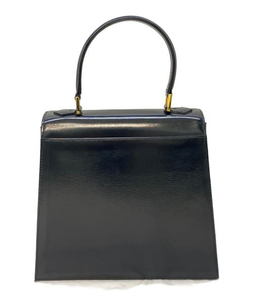 Yves Saint Laurent（イヴサンローラン）Yves Saint Laurent (イヴサンローラン) エナメルハンドバッグ ブラックの古着・服飾アイテム