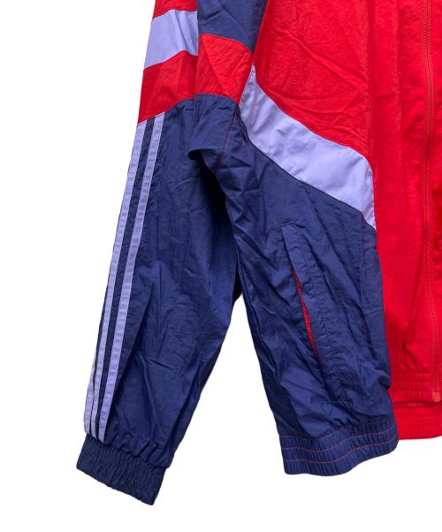 adidas（アディダス）adidas (アディダス) ナイロンジャケット レッド×ブルー サイズ:2XLの古着・服飾アイテム