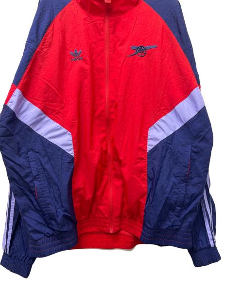 adidas（アディダス）adidas (アディダス) ナイロンジャケット レッド×ブルー サイズ:2XLの古着・服飾アイテム