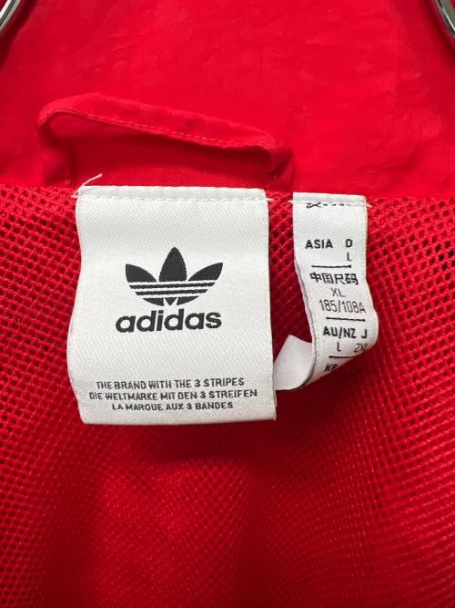 adidas（アディダス）adidas (アディダス) ナイロンジャケット レッド×ブルー サイズ:2XLの古着・服飾アイテム