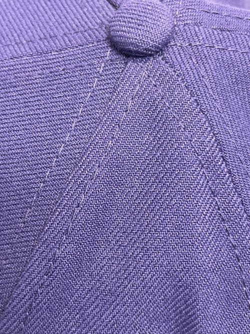 New Era（ニューエラ）New Era (ニューエラ) Denim Tears (デニムティアーズ) キャップ パープルの古着・服飾アイテム