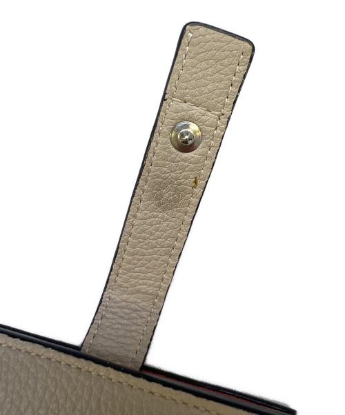 LOEWE（ロエベ）LOEWE (ロエベ) コンパクトジップウォレット ベージュ×オレンジの古着・服飾アイテム