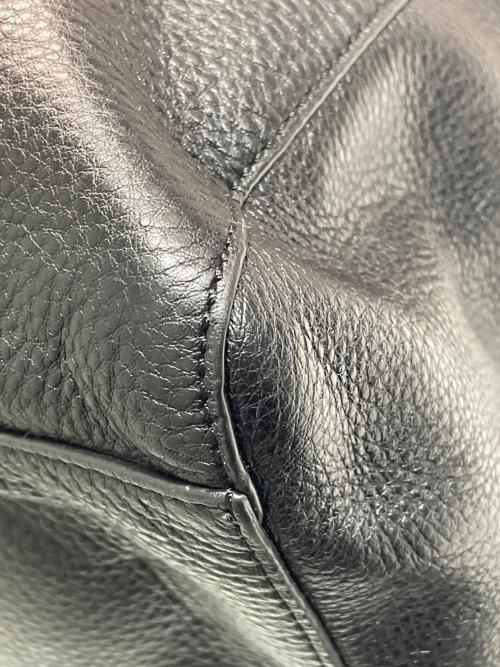 TORY BURCH（トリーバーチ）TORY BURCH (トリーバーチ) レザータッセルリュック ブラックの古着・服飾アイテム