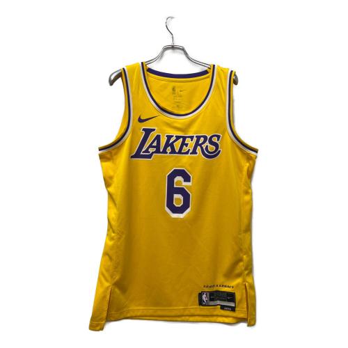 NIKE（ナイキ）NIKE (ナイキ) トレーニングウェア イエロー サイズ:Mの古着・服飾アイテム