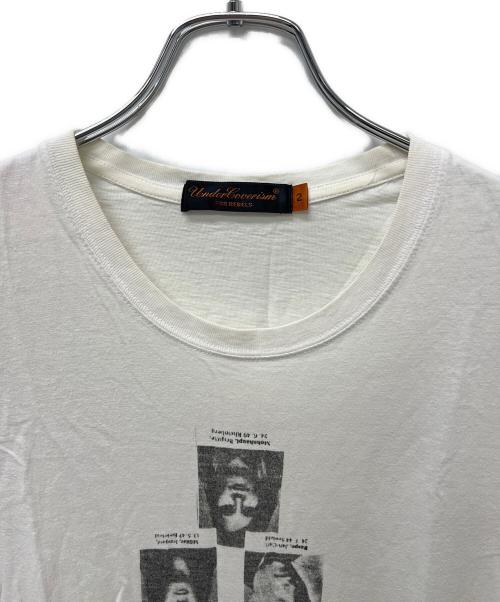 UNDERCOVERISM（アンダーカバーイズム）UNDERCOVERISM (アンダーカバーイズム) ドイツ赤軍指名手配 Tシャツ ホワイト サイズ:２の古着・服飾アイテム