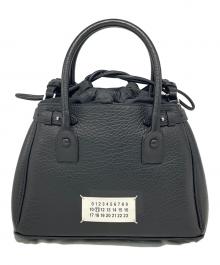 Maison Margiela（メゾンマルジェラ）の古着「5AC ドローストリングミニバッグ」｜ブラック