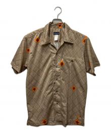Patagonia（パタゴニア）の古着「リズムシリーズS/Sシャツ」｜ベージュ