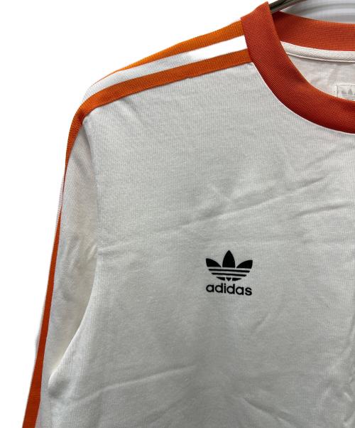 adidas（アディダス）adidas (アディダス) ロングスリーブカットソー ホワイト×オレンジ サイズ:Ｌの古着・服飾アイテム