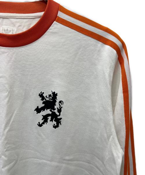 adidas（アディダス）adidas (アディダス) ロングスリーブカットソー ホワイト×オレンジ サイズ:Ｌの古着・服飾アイテム