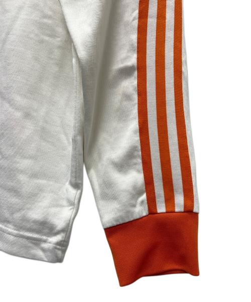 adidas（アディダス）adidas (アディダス) ロングスリーブカットソー ホワイト×オレンジ サイズ:Ｌの古着・服飾アイテム