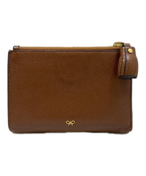 ANYA HINDMARCH（アニヤ・ハインドマーチ）ANYA HINDMARCH (アニヤ・ハインドマーチ) 2つ折り財布 ブラウンの古着・服飾アイテム