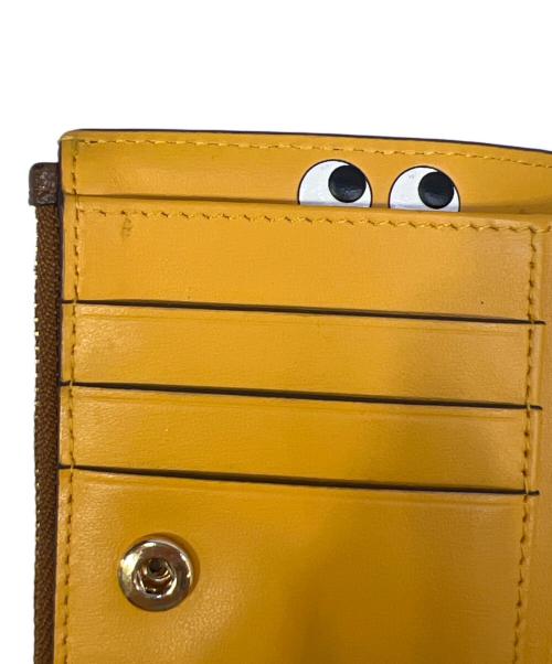 ANYA HINDMARCH（アニヤ・ハインドマーチ）ANYA HINDMARCH (アニヤ・ハインドマーチ) 2つ折り財布 ブラウンの古着・服飾アイテム