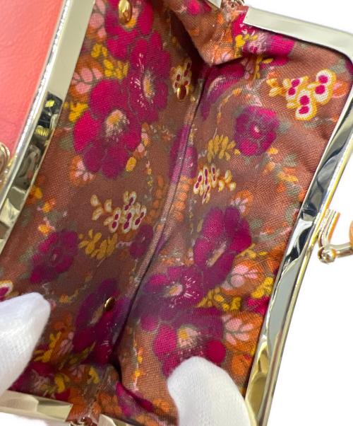 ANNA SUI（アナスイ）ANNA SUI (アナスイ) プレイングキャット がま口財布 ピンクの古着・服飾アイテム
