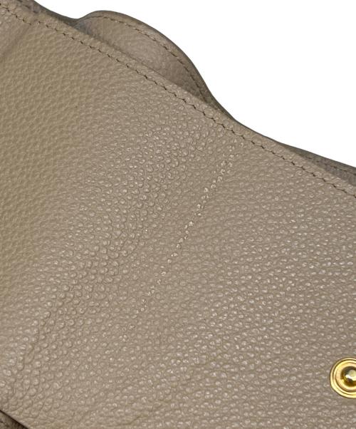 Yves Saint Laurent（イヴサンローラン）Yves Saint Laurent (イヴサンローラン) オリガミタイニーウォレット ベージュの古着・服飾アイテム