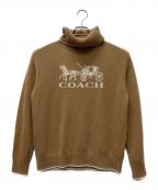 COACHコーチ）の古着「オーバーサイズドホース&キャリッジタートルネック」｜ベージュ