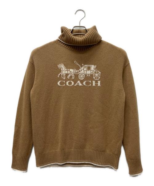 COACH（コーチ）COACH (コーチ) オーバーサイズドホース&キャリッジタートルネック ベージュ サイズ:ＸＳの古着・服飾アイテム