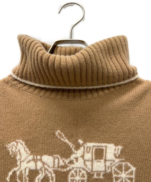 COACH（コーチ）COACH (コーチ) オーバーサイズドホース&キャリッジタートルネック ベージュ サイズ:ＸＳの古着・服飾アイテム