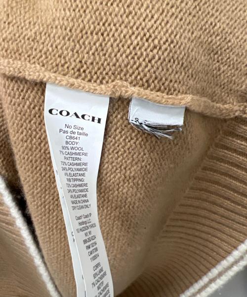 COACH（コーチ）COACH (コーチ) オーバーサイズドホース&キャリッジタートルネック ベージュ サイズ:ＸＳの古着・服飾アイテム