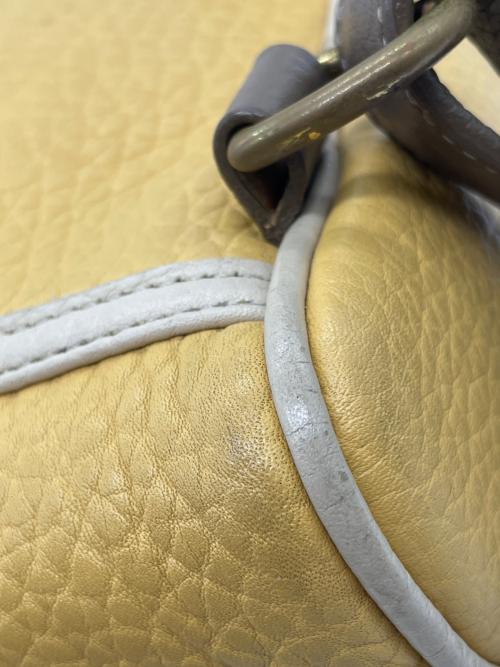DOONEY&BOURKE（ドゥーニーアンドバーク）DOONEY&BOURKE (ドゥーニーアンドバーク) ミニリュック ブラウン×イエローの古着・服飾アイテム