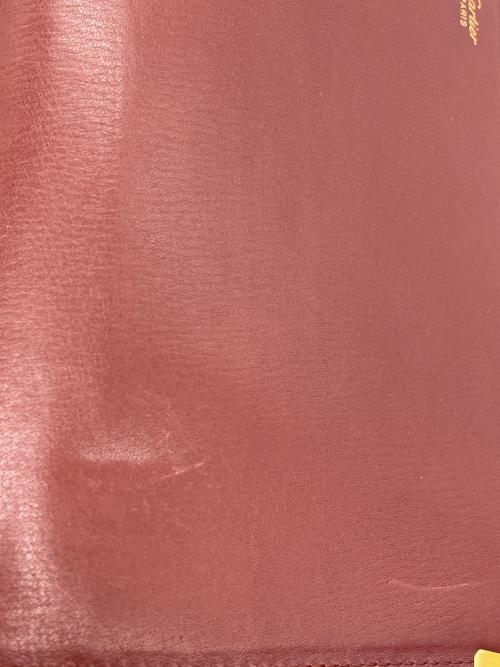 Cartier（カルティエ）Cartier (カルティエ) マストライン クラッチバッグ レッドの古着・服飾アイテム
