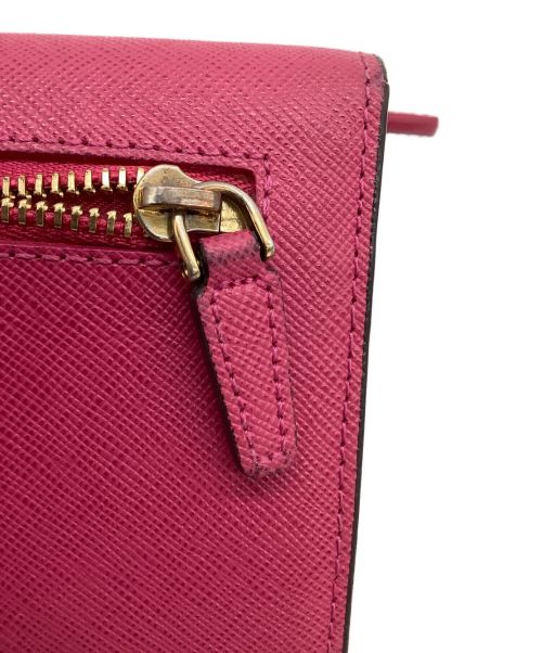 MCM（エムシーエム）MCM (エムシーエム) 3つ折り長財布 ショッキングピンクの古着・服飾アイテム