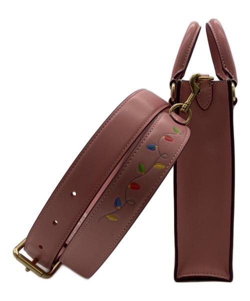 COACH（コーチ）COACH (コーチ) DISNEY (ディズニー) North South Mini Tote（ノース サウス ミニ トート） ピンクの古着・服飾アイテム