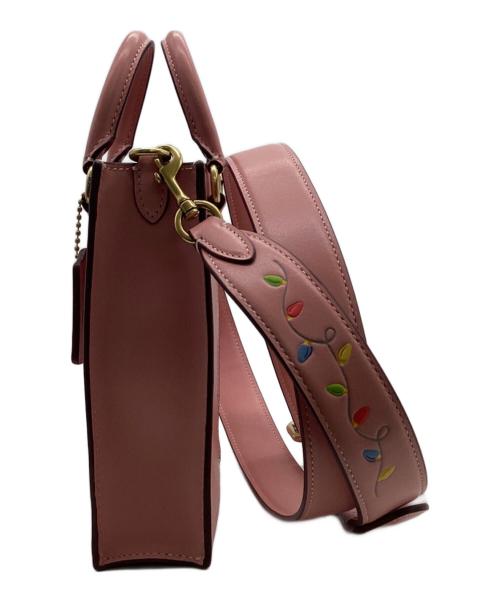 COACH（コーチ）COACH (コーチ) DISNEY (ディズニー) North South Mini Tote（ノース サウス ミニ トート） ピンクの古着・服飾アイテム