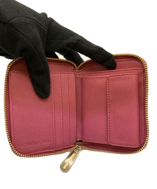 MICHAEL KORS（マイケルコース）MICHAEL KORS (マイケルコース) コンパクトウォレット ピンクの古着・服飾アイテム
