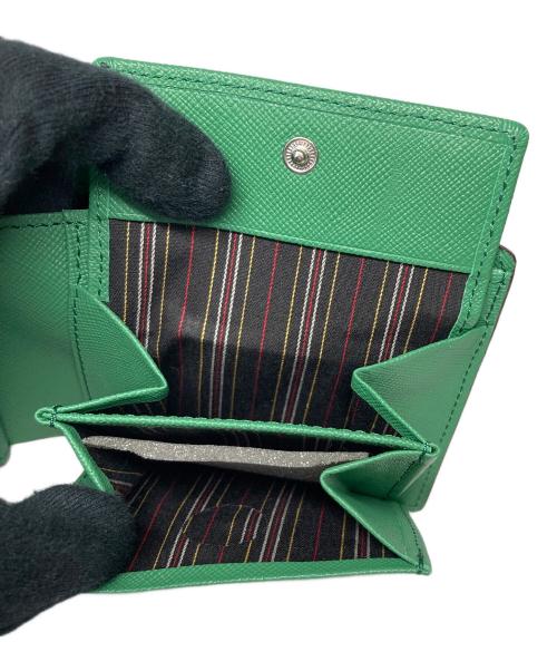 TAKEO KIKUCHI（タケオキクチ）TAKEO KIKUCHI (タケオキクチ) 2つ折り財布 ブラック×グリーンの古着・服飾アイテム
