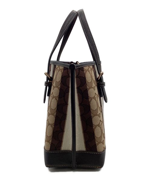COACH（コーチ）COACH (コーチ) ストライプジャガード モリー25　2WAYバッグ ブラウン×ブラックの古着・服飾アイテム