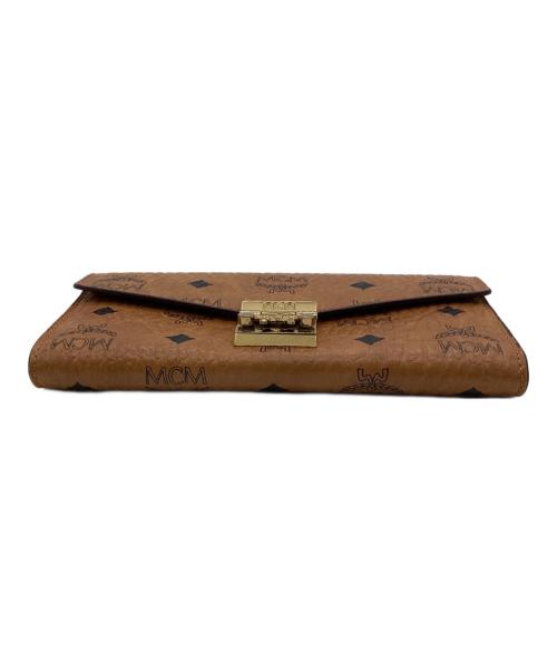 MCM（エムシーエム）MCM (エムシーエム) PATRICIA FLAP WALLET LARGE（パトリシア フラップ ウォレット ラージ） ブラウンの古着・服飾アイテム