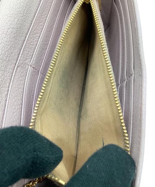 MIU MIU（ミュウミュウ）MIU MIU (ミュウミュウ) MADRAS 長財布 ピンクの古着・服飾アイテム