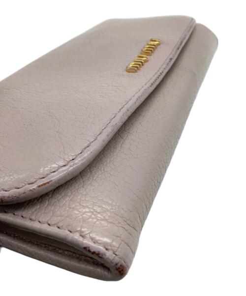 MIU MIU（ミュウミュウ）MIU MIU (ミュウミュウ) MADRAS 長財布 ピンクの古着・服飾アイテム