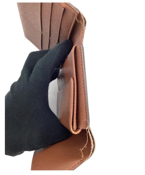 LOUIS VUITTON（ルイ ヴィトン）LOUIS VUITTON (ルイ ヴィトン) モノグラム ポルトトレゾール・インターナショナル 3つ折り長財布 ブラウンの古着・服飾アイテム