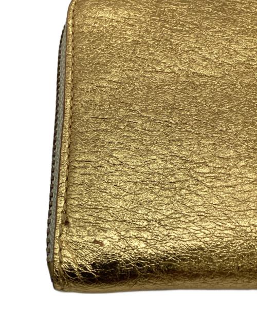 COMME des GARCONS（コムデギャルソン）COMME des GARCONS (コムデギャルソン) L字ファスナーウォレット ゴールドの古着・服飾アイテム