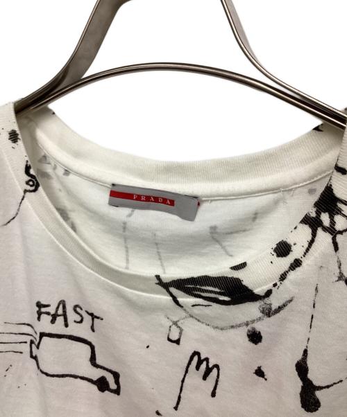PRADA（プラダ）PRADA (プラダ) Adam Neate（アダム ニート）Tシャツ ホワイト サイズ:XLの古着・服飾アイテム