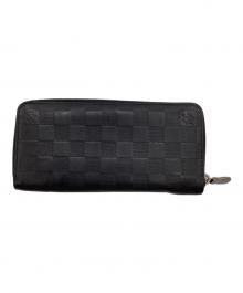 LOUIS VUITTON（ルイ ヴィトン）の古着「ダミエ アンフィニ ジッピーウォレット ヴェルティカル」｜ブラック