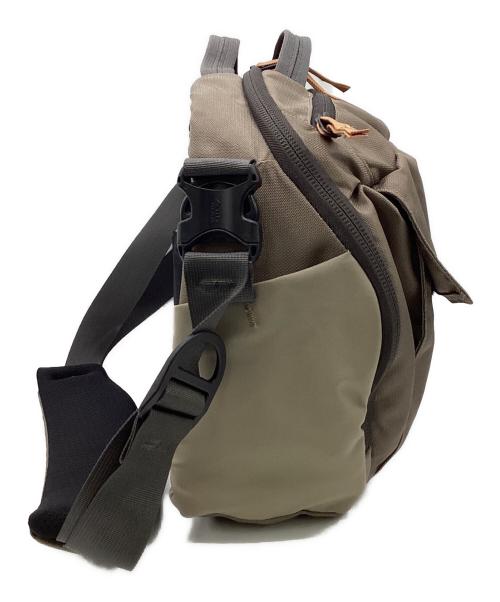 MYSTERY RANCH（ミステリーランチ）MYSTERY RANCH (ミステリーランチ) ディストリクト PRO ショルダーバッグ ベージュの古着・服飾アイテム