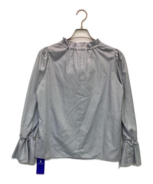 BLUE LABEL CRESTBRIDGE（ブルーレーベルクレストブリッジ）BLUE LABEL CRESTBRIDGE (ブルーレーベルクレストブリッジ) マイクロピーチスパンスタンドフリルブラウス ブルー サイズ:36の古着・服飾アイテム
