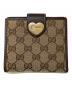 GUCCI（グッチ）の古着「GGキャンバス 2つ折り財布」｜ベージュ