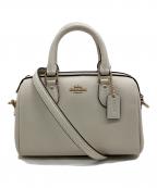 COACHコーチ）の古着「ミニローアンクロスボディ」｜アイボリー