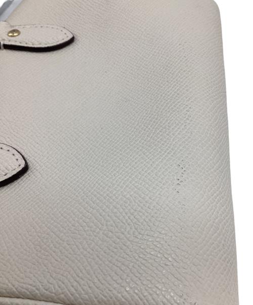 COACH（コーチ）COACH (コーチ) ミニローアンクロスボディ アイボリーの古着・服飾アイテム