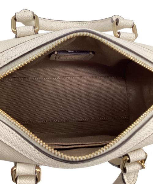 COACH（コーチ）COACH (コーチ) ミニローアンクロスボディ アイボリーの古着・服飾アイテム